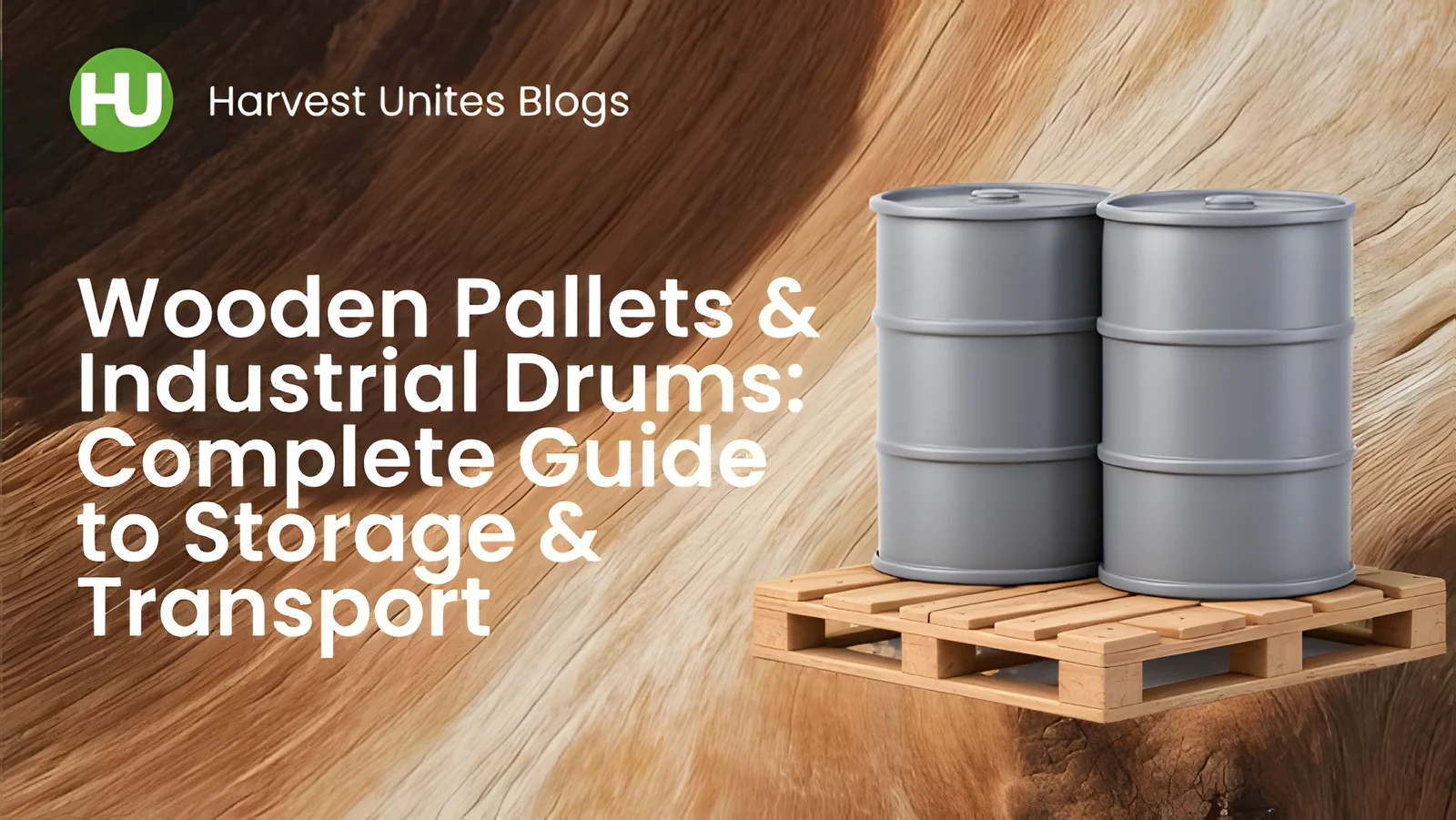 Two grey industrial drums on a wooden pallet against a natural wood-grain background
